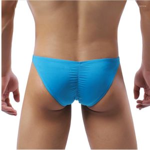 Slip Sexy sous-vêtements hommes slips mâle Mini culotte pénis poche String taille basse Bikini Hombre Lingerie exrotique mode Cool