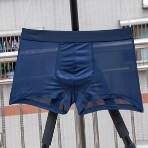 Calzoncillos boxeadores de hombres transparentes abultados seda de hielo ver a través de hombres sexy ropa interior bragas de cintura baja lencería íntima