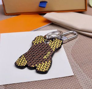 Unisex ontwerper dobbelstenen afneembare sleutelhangers honden aolly metaal handgemaakte mode sleutelring mannen vrouwen hangpatroon auto sleutelhanger sieraden