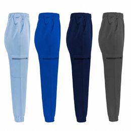 Unisex elasticiteit Effen kleur medische werkbroeken Veterinaire operatiekamer Scrubs Broek Schoonheidsagentschap Jogger verpleegsteruniformen v1FF#