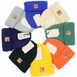 Unisexe Solide Acrylique Chapeau Bonnet Bandes Tricot Casquette De Luxe Designer Hommes Dame Casual Épais Hiver Chaud Pull Laine Crâne Chapeau Casquettes De Ski Chapeaux De Rue Accessoires De Mode