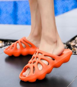 Les pantoufles d'été unisexes glissent sur des chaussures de trou de plage fraîche respirant couples Sandales de gelée des diapositives inédites plus taille 35462510817