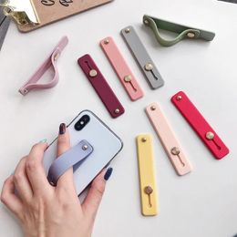 Universele polsband telefoonhouder voor iPhone Finger Grip mobiele telefoonstandaard voor Samsung Huawei Push Back Sticked Socket Bracket