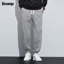 Unvanqu printemps hommes polyvalent lâche pantalons décontractés tricot sarouel mode élastique respirant Jogging sport pantalon mâle 240126