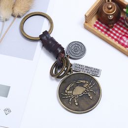 Update Bronze schijf Control Keyring 12 Horoscoopteken Keychain Leather Weave Bag Hang Hanger Rings For Women Men Fashion Jewelry