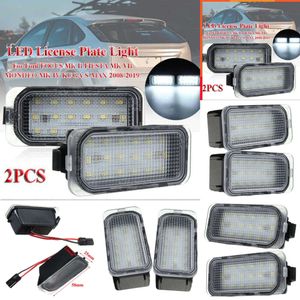 Actualización nueva 2 uds 12V LED luz de placa de matrícula 18 Leds lámparas de señal blancas sin Error lámpara de maletero para Ford FOCUS II FIESTA VII MONDEO