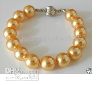 Utsökt guldskal pärla kvinnor silverarmband 7,5 tum