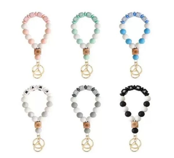 UPS Mother039s Day MAMA Silicone Party Favor Poignet Porte-clés Pour Women039s Nouveau Lostproof Papillon Handbeaded Bracelet Cadeau3437842