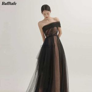 Stedelijke sexy jurken bafftafe eenvoudige zwart strand Korea dame prom jurken zachte tule een schoudervloer lengte formele avondjurk 2024 240410