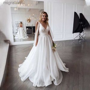 Stedelijke sexy jurken diepe v-hals organza en tule plus size trouwjurk backless 28W bruidsjurken eenvoudig yq240329