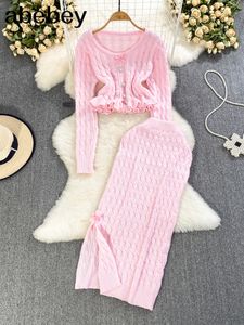 Robes sexy urbaines noeud rose costumes tricotés à manches longues pull ample taille haute jupe moulante style coréen femme automne ensembles solides maigres 230915