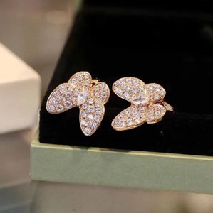 V Material de oro Pendimiento de clip de calidad de lujo con toda la forma de mariposa de diamante para mujeres y amigas Joyas de compromiso de joyería Have Stamp Q5