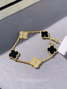 V-vergulde 18K gouden armband voor dames Designer armband met doos Vijf bloemen armband Vrouwelijk goud Dubbelzijdig Natuurlijk Chalcedoon Sieraden Elegant Parelmoer