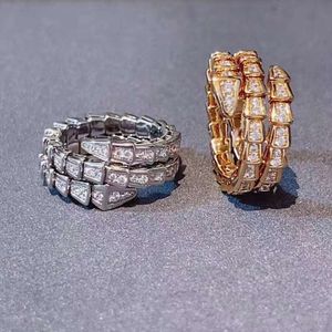 V-Gold vergulde roségoud gevormd vol met diamant inleg, drie cirkels open elastische slangenkopring