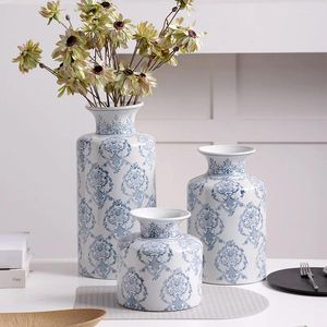 Vases Vases en porcelaine bleu et blanc Ornements de fleurs Arrangement de fleurs salon chinois Ceramics classiques décoration American Retro entor