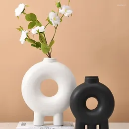 Vasos O vaso de arte em estilo nórdico é muito simples e abstrato. Terrário cerâmico das decorações da flor do agregado familiar do vento quieto