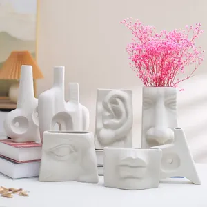 Vazen Noord -Europese keramische vaas Modern Simple Art Home Decor Creative Ornamens Face Facial Features Hydroponic Flower Arrangement