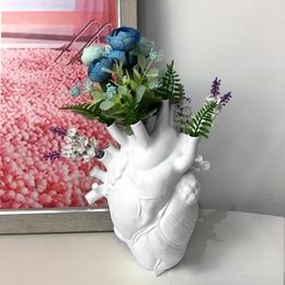 Vases en résine Vase d'art avec ornement de fleurs séchées Design de cœur anatomique pour une décoration intérieure unique salon idéal