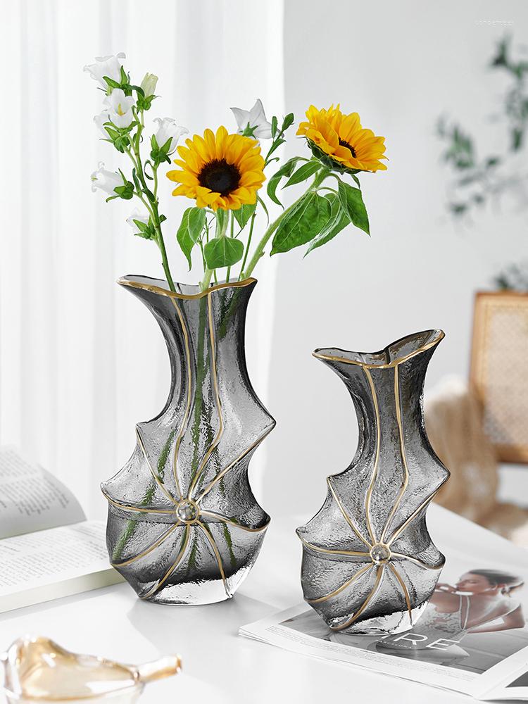 LuxTrac Glass Vase: Gold Accents, Clear Design for Elegant Floral Decor.