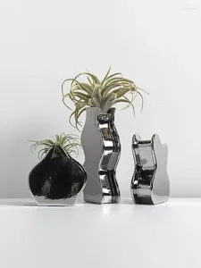 Vazen zilver kleine vaas bloemen natuundige stijl eenvoudige huis woonkamer en voorbeeld hal el decoratie