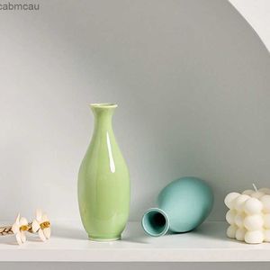 Vases Simple Nordic Ceramics Vase Mini Flower Plantes Pot Pot Hydroponic Contene Fleurs Ornement Ornement de salon Décoration de banquet de salon