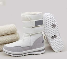 Terciopelo para mujer Felpa gruesa cálida impermeable antideslizante versión coreana botas para la nieve zapatos de algodón para hombres y mujeres Aire libre yakuda dhgate Deportes al aire libre Zapatos al aire libre