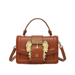 ver designer tassen dames zadel vierkant tas mode eenvoudige veelzijdige crossbody tas metalen textuur mobiele telefoon tas 240415