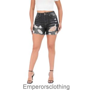 Veelzijdige en noodlijdende dames denim shorts met ruwe randen 2024 Nieuwe stijlvolle zwarte high taille slanke jeans