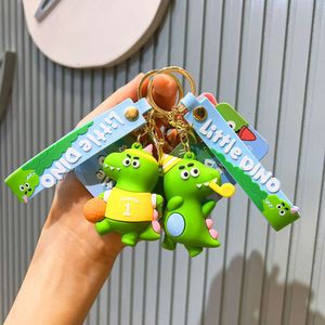 Pendentif pour voitures de dinosaure polyvalente, bijoux de porte-clés, sac cadeau de porte-clés, jolie petite poupée