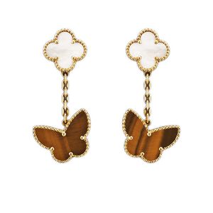 Boucles d'oreilles tendance polyvalentes pour hommes et femmes mourir des boucles d'oreilles à quatre feuilles de feuille de fleur de fleur