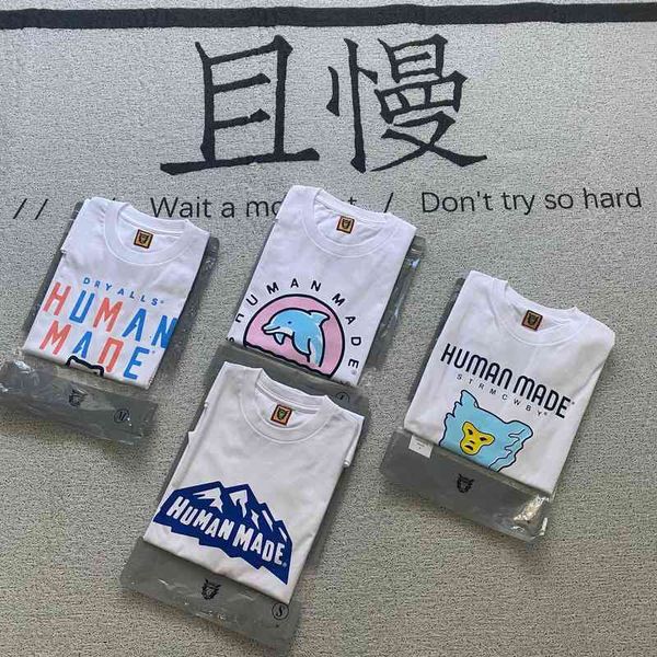 Version correcte de Human Made x Reo Polar Bear Dolphin Ice Stick Snow Mountain Couple T-shirt à manches courtes pour hommes et femmes