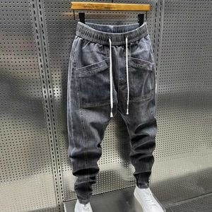 Vidh jean masculin élastique traw-cordon pantalon de cargaison en denim avec poches pantalon de couleur de couleur solide pour le printemps automne D240417