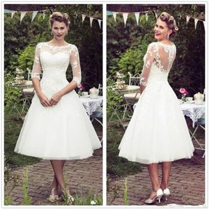 Vintage 50's stijl korte kanten bruiloft jurken halve mouwen tule kanten applique thee lengte bruidsjurken met knopen c310q