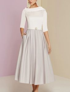 Vintage A-lijn moeder van de bruid jurk 2203 Elegante juweel nek thee lengte halve mouw plooien kristallen bruiloft gastenfeestjurken