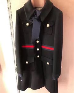 Manteaux longs Vintage noir/blanc pour femmes, avec nœud de styliste, gros boutons avec lettres, manteau en laine pour femmes, grande taille, vêtements d'extérieur 82007