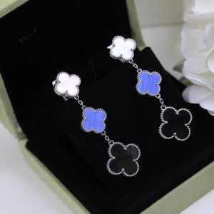 Pendientes de lámpara de araña de colgación vintage de 18k Madre blanca chapada de oro Tres Purple White Four Clover Flower Drop para mujeres Joyas con caja