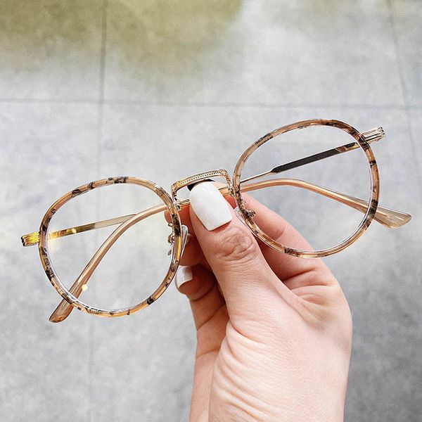 Diseñador de vintage con gafas redondas hermosa Metal marco óptico lentes grandes con envoltura de plástico moda mujer gafas