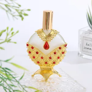 Bouteilles de parfum élégantes Vintage moyen-orient Dubai Style bouteille en verre de couleur or d'huile essentielle bouteille de parfum rechargeable