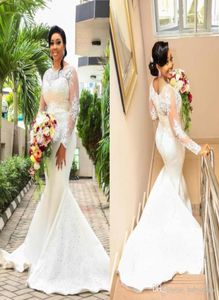 Vintage Lace Mermaid Wedding Jurken 2020 Sheer Long Sleeve Jewel Appliques kralen Sweep Train Afrikaanse bruidsjurken plus maat Cust1929911