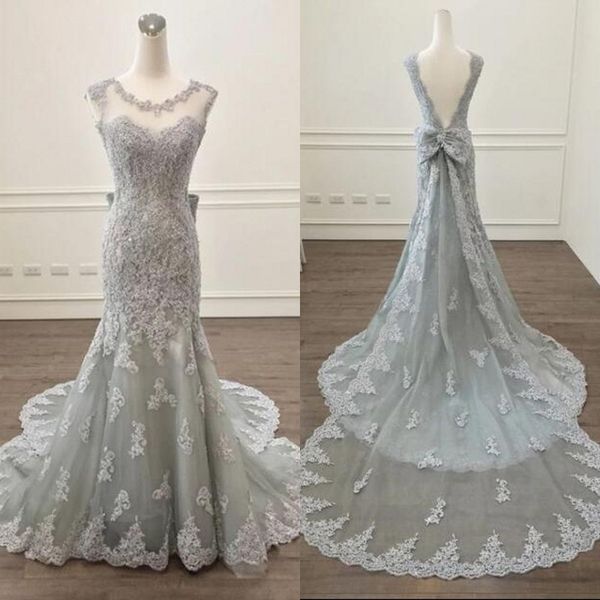 Robes de mariée sirène en dentelle et tulle vintage, col ras du cou, sans manches, dos nu, argentées, avec train attaché, grand nœud