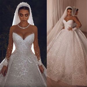 Vintage bruiloft Arabische jurken Kristallen Pure Lage Sleeve Lace kralen Baljurk Vestido de novia bruidsjurk