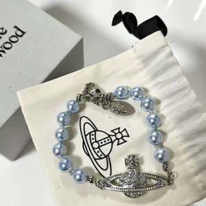 Viviene Westwoods Designer Jewelry Empress Dowager Xis Nouveau bracelet Saturne en perles bleues avec design de niche personnalisé, polyvalent et plein de diamants Planète perlée