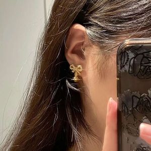 Viviennes westwood boucles d'oreilles haut noeud clouté diamant boucles d'oreilles femme lumière luxe boucles d'oreilles