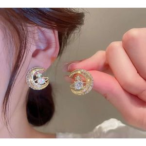Viviennes Westwood boucles d'oreilles populaires avec zircon lune Saturne boucles d'oreilles qui respirent la mode sens