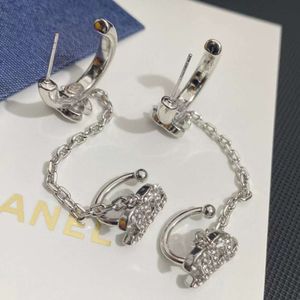 Viviennes Westwood boucles d'oreilles Zircon cristal chaîne gland oreille Clip intégré eau diamant boucles d'oreilles
