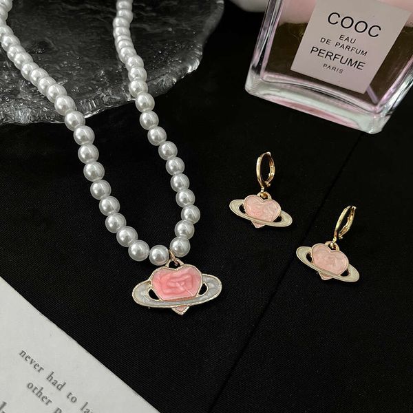 Viviennes Westwoods bijoux goutte glaçure rose amour planète collier de perles femme coeur belle mode boucles d'oreilles