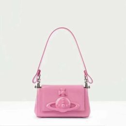 Viviennes Westwoods roze tas onderarm tas lakleer Leer helder gezicht Handheld pittig meisje kleine vierkante tas veelzijdig
