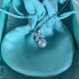 Vkg5 Pendentif Colliers T Famille S925 Argent Sterling Tiffanynet Femmes Perle Naturelle Oeil de Cheval Seiko Production Mode Lumière Luxe Niche Perle Clavicule Chaîne