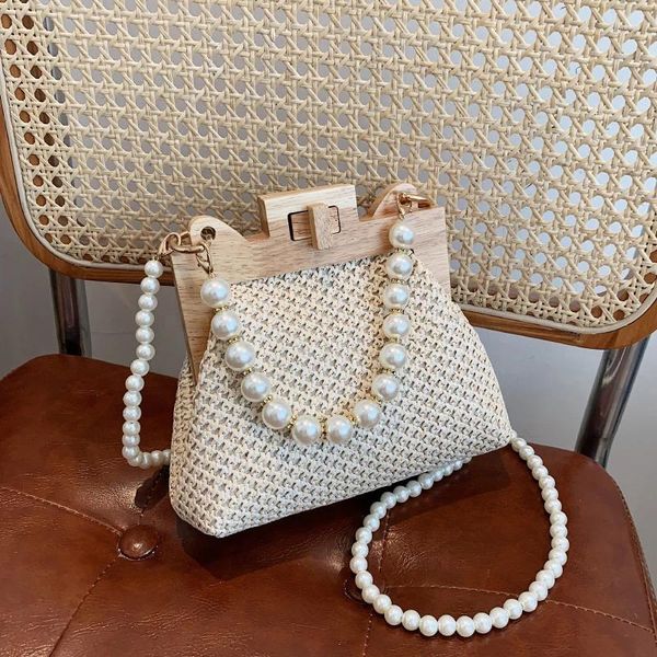 Bolsas de cintura de paja con cerradura de madera para mujer, bolso cruzado con perlas, bolsos de moda y bolsos de diseñador de lujo, bolso de mano grande