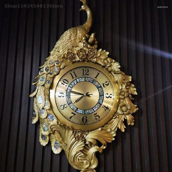 Relojes de pared de latón con entrada de pavo real, reloj para el salón, Villa, luz de estilo europeo de alta gama, colgante de lujo, silencioso, totalmente de cobre